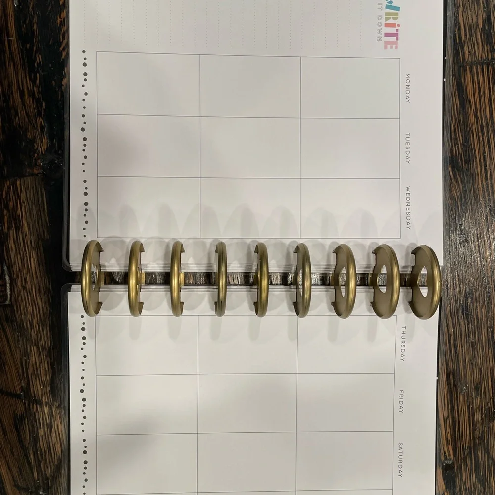 The Happy Planner Colorful Wave Calendar -mix of pages, rings, monthly dividers.